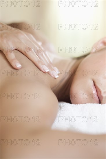 Caucasian woman having a massage