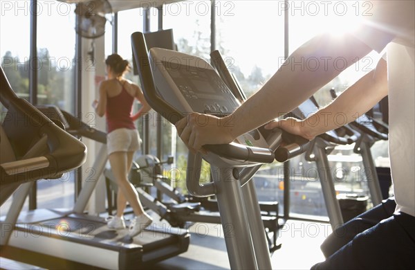 People exercising in health club