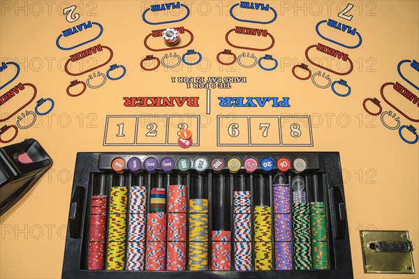 Gambling chips at baccarat table