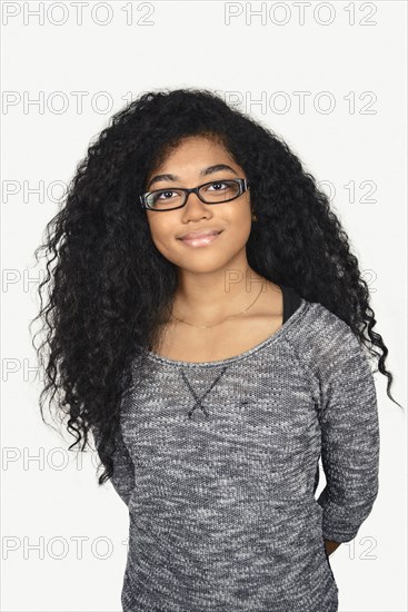 Portrait of smiling Mixed Race teenage girl