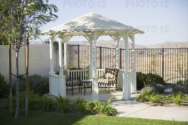 Small backyard gazebo with patio furniture