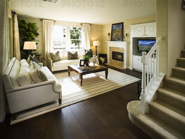 Interior traditional living room with staircase