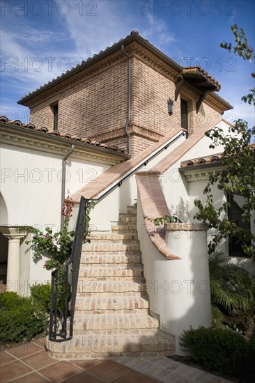 Brick staircase with wrought iron railing