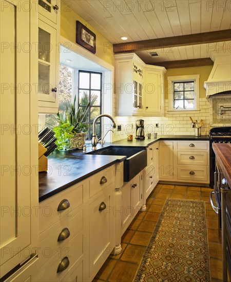 Contemporary kitchen in spanish style home