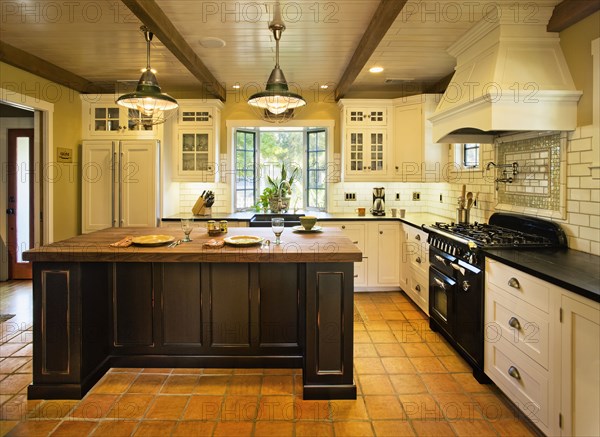 Contemporary kitchen in spanish style home