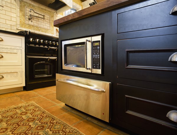 Detail microwave built into kitchen island