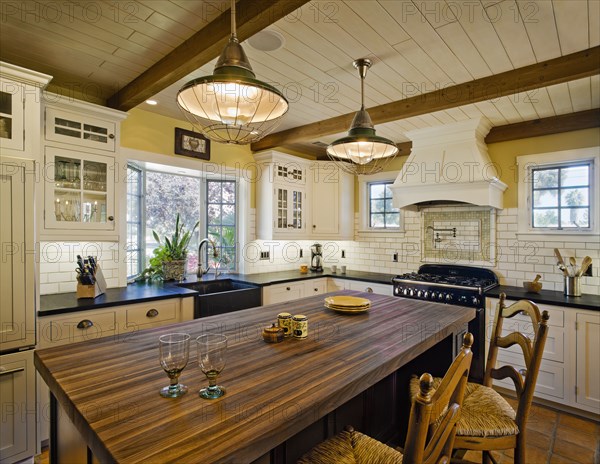 Contemporary kitchen in spanish style home