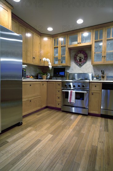 Hardwood floor in traditional kitchen