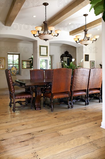 Arranged dining table on hardwood floor