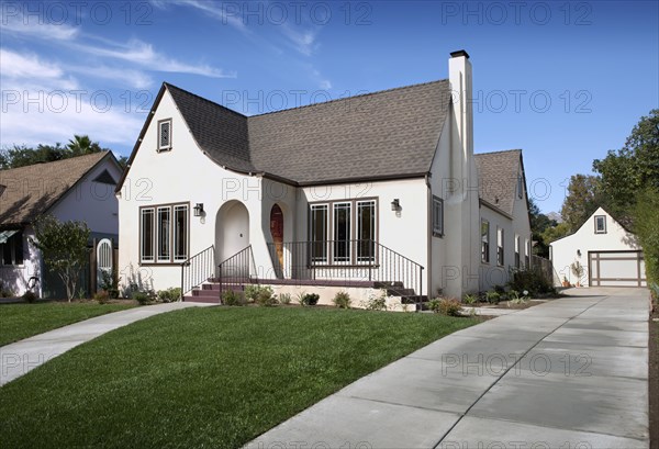 Exterior of cottage with lawn in front