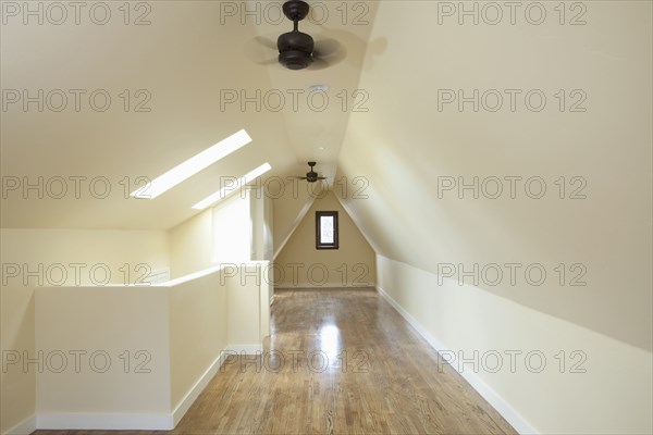 Empty attic bedroom in home