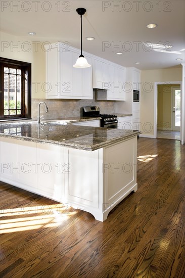 Hardwood floor in traditional kitchen