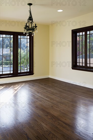 Chandelier hanging in empty room