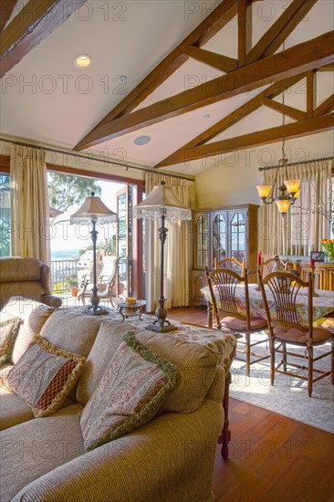 Living room and dining area in traditional home