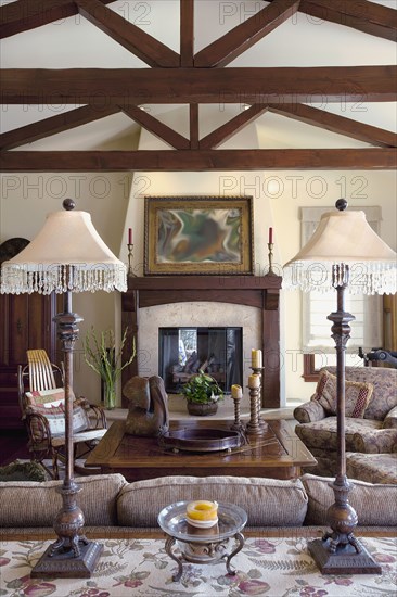 Lamps on end table in traditional living room