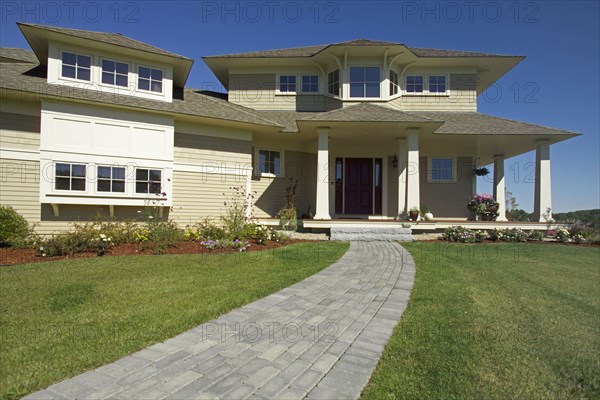 Walkway leading to the entrance of single family home