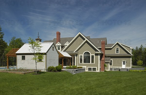 Exterior of a single family home against cloudy sky