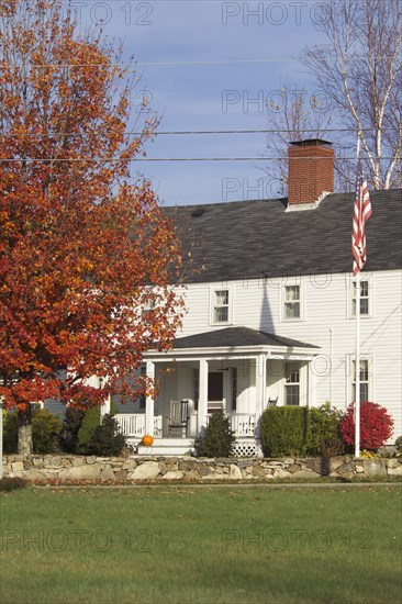 Exterior of single family home with lawn