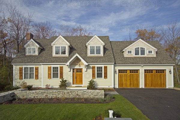 Driveway leading towards garage of single family home