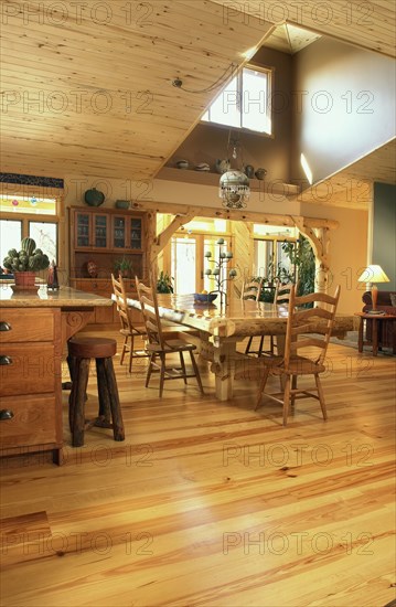 Interior of contemporary great room with pine hardwood floors