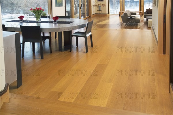 White Oak hardwood floor through out contemporary dining and living rooms