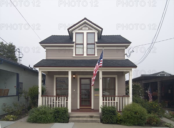 Exterior view two story American Craftsman styled bungalow at Pacific Grove