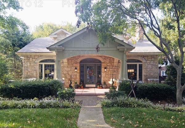 Front exterior one story craftsman bungalow