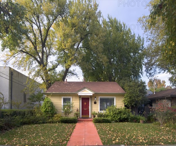 Front exterior yellow cottage