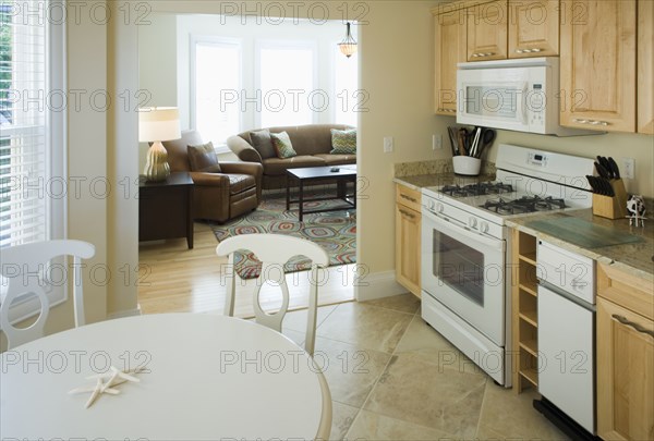 Traditional kitchen with doorway to living room