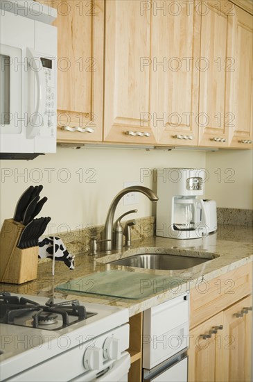 Traditional kitchen with light colored cabinets