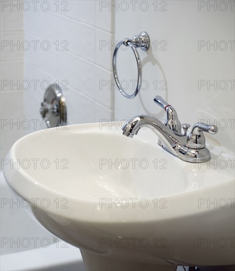 Small white pedestal sink