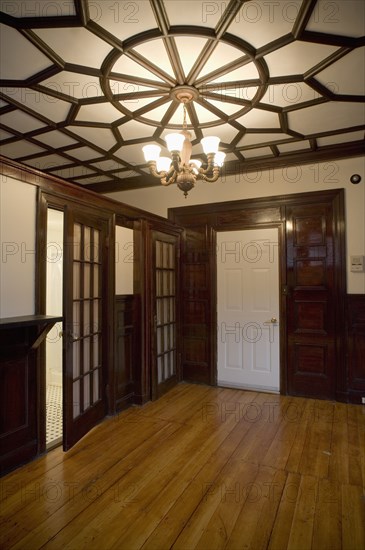 Empty room in apartment with hardwood floor