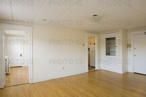 Empty room in apartment with hardwood floor