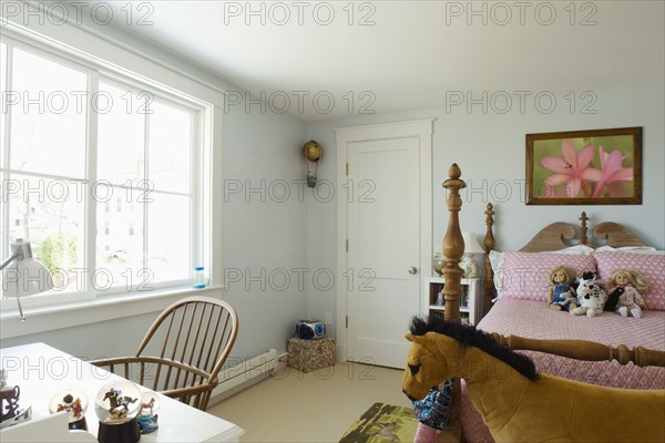 Girls bedroom with post bed