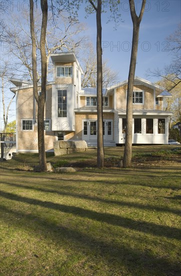 Contemporary multiple story shingle style house