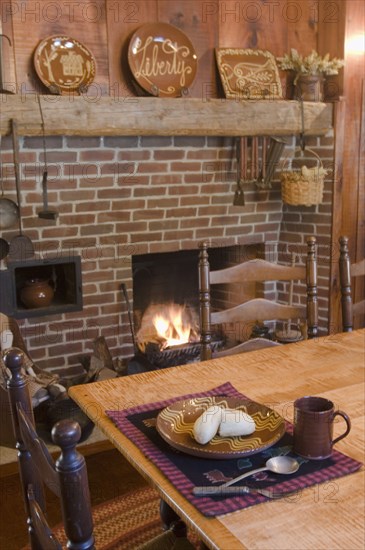 Place setting in colonial style dining room