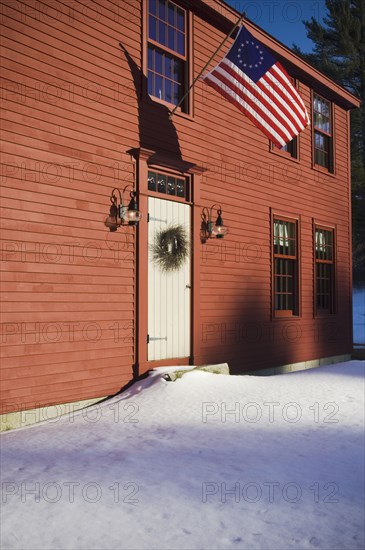 Front entrance red saltbox style home