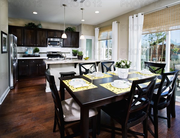 Dining area and kitchen in contemporary home