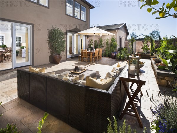 Sitting and dining areas on back patio