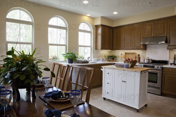 Split-level open plan dining area and kitchen at home