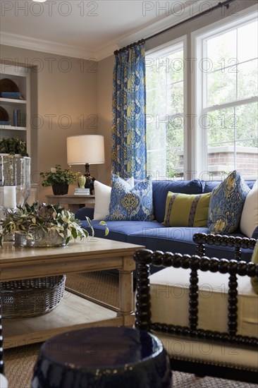 Cropped couch with coffee table in the living room at home