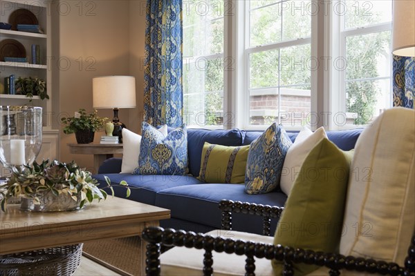 Cropped couch with coffee table in the living room at home