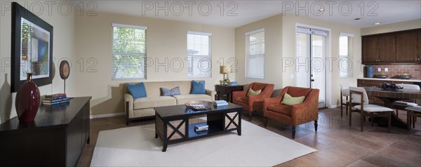 Split-level open plan living room and kitchen at home