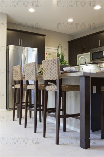 High stools at the kitchen island at home