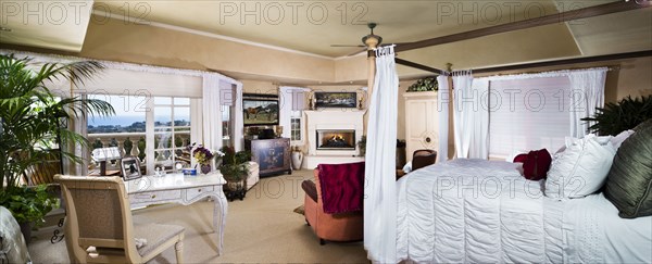 Spacious and large bedroom with study table at home