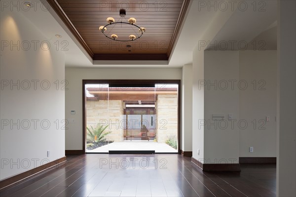 Empty large foyer with closed glass door