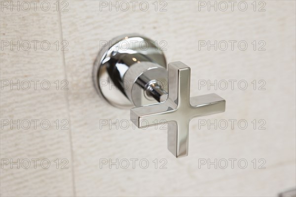 Close-up of shower tap at home