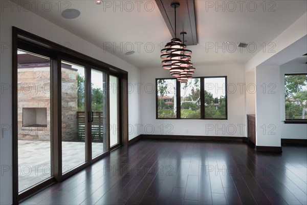 Creative hanging light in empty foyer at home