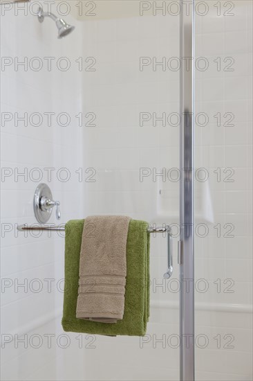 Close-up of towels on rail in the bathroom at home