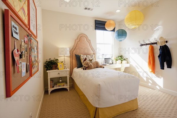 Single bed in kid's bedroom at home